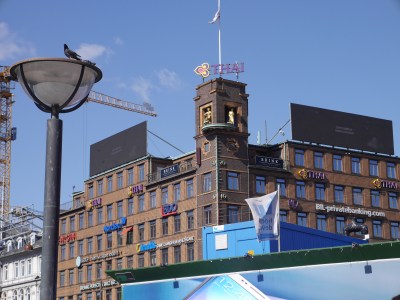 Indecisive gold lady barometer: comes out on a bike if fair and with an umbrella if not