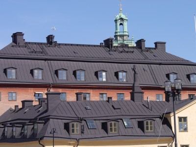 Buildings are painted red tp look like brick or yellow like stone
