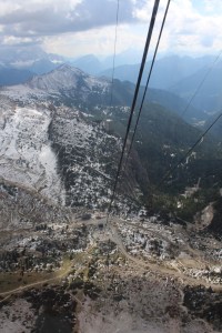 Getting higher and J now in the centre of the cable car checking his show laces!