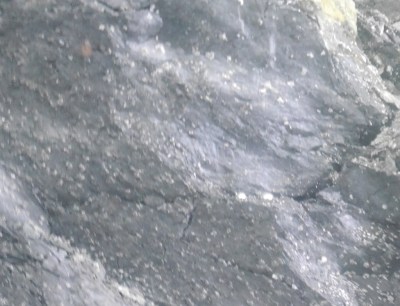 Mercury found in pure liquid form .. you may just make out two small dots, or as a compound with cinnabar that had to be heated to 600-800 deg C to be turned to gas and then captured.