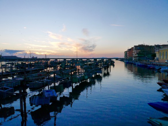Sunset over the boats and nets on our walk home