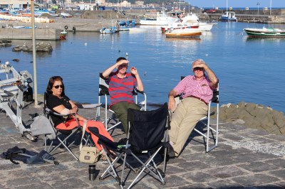 Coffees after lunch sitting on the harbour wall.