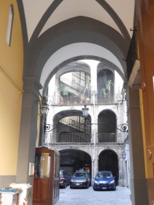 Courtyards behind large gates - now flats and offices