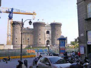 Meeting point for the tour - Castello Nuevo - typical of Napoli ... wonderful architecture .... but so much covered with scaffolding and surrounded by cars. 